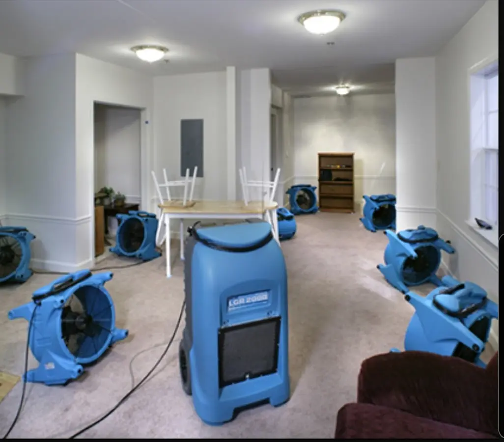 Air movers and dehumidifier setup for Water Damage Restoration in Mineral Wells